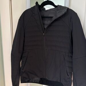 Lululemon Black Light Puffer Jacket, would best fit a women’s S-M